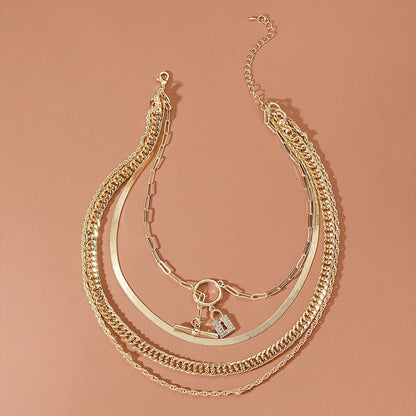 Enhance Your Style with the Glamorous Layered Crystal Lock Chain Necklace Set